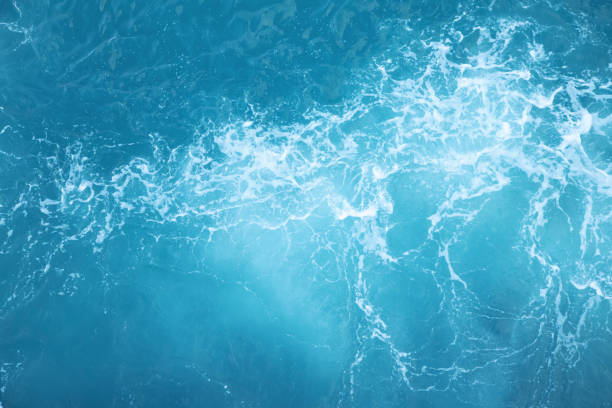 istock Sea Waves in ocean wave Splashing Ripple Water. Blue water background. 1142335883