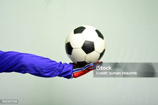 Soccer Goalkeeper Holding Soccer Ball Stock Photo - Download Image Now - Hand, Soccer, 35-39 Years