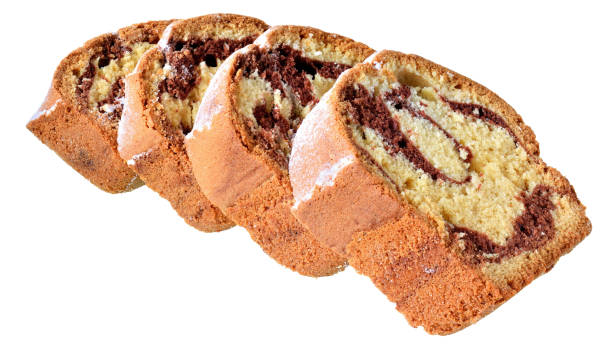 istock Sliced ​​marble cake closeup isolated 1142338856