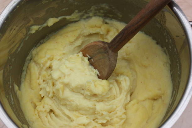 istock Mashed potatoes at the end of cooking in a Dutch oven 1142344134