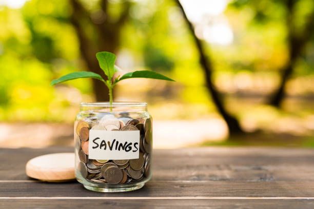 istock Coins in jar. Saving money concept. 1142360008