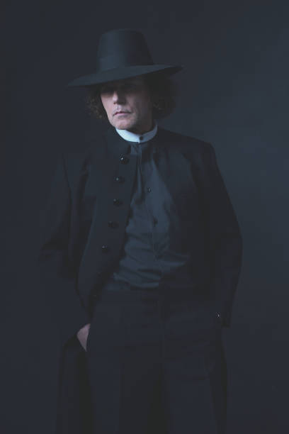 istock Mysterious victorian man in hat and black coat. 1142361809