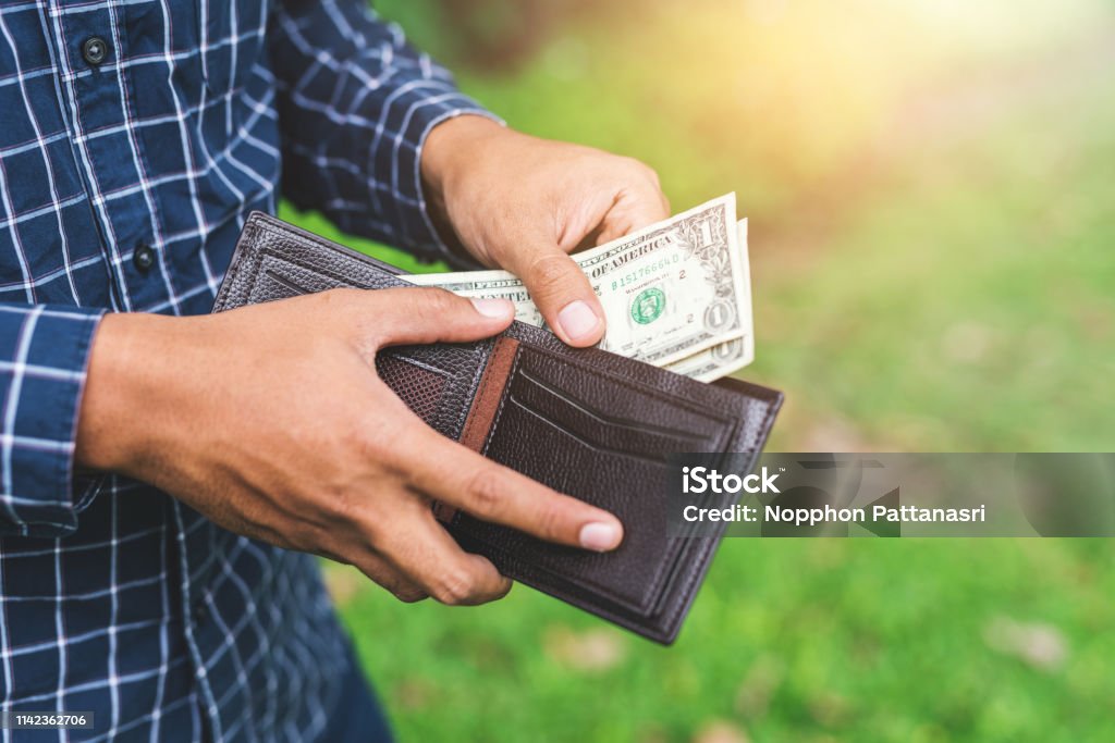 Money in wallet Wallet Stock Photo