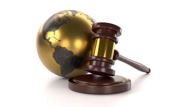 istock Gold and Black Globe with a Gavel 1142364137