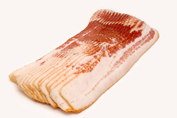 Raw bacon slices  uncooked bacon stock pictures, royalty-free photos & images