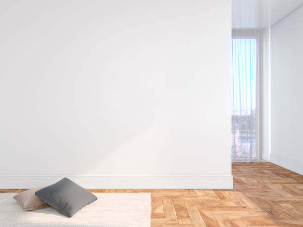 istock White blank wall empty interior with pillows, carpet, curtain and herringbone wood floor. 3d render illustration mock up 1142364632