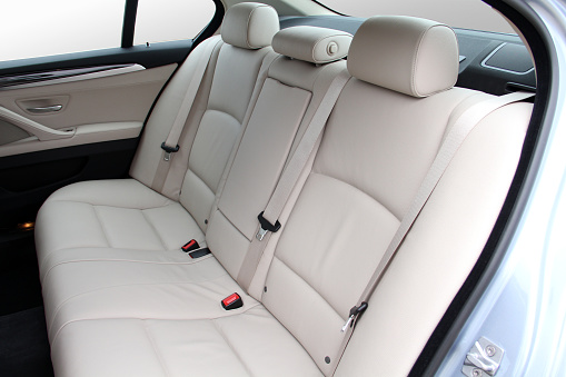 rear seats covered with fabric in a luxury car