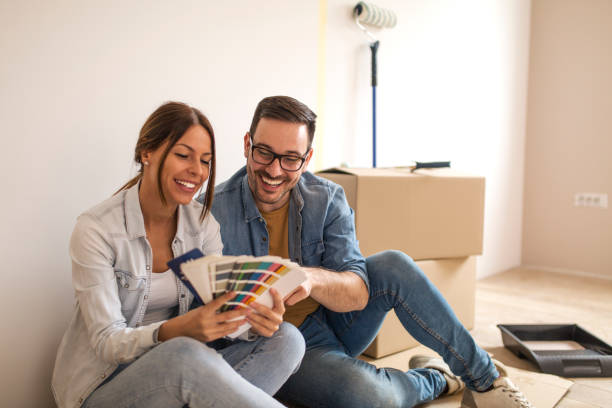istock Couple choosing color for the walls 1142365692