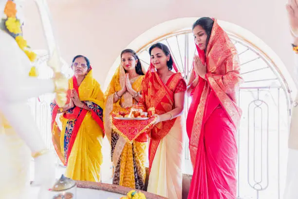 Portrait, Indian, Hindu, Celebration - A Group of Religious Women Performing Hindu Prayer Routines at a Temple