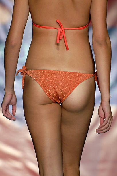 women ass in bikini from behind  catwalk fashion show fashion swimwear stock pictures, royalty-free photos & images