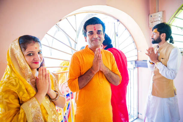 istock Married Hindu Couple Visiting a Temple 1142375157