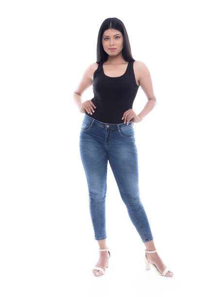 istock Indian Young lady with blue jeans and black camisole 1142375572