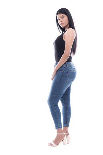 istock Indian Young lady with blue jeans and black camisole 1142375573