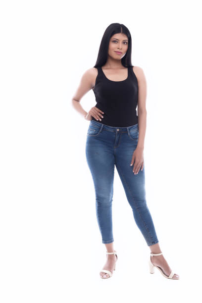 istock Indian Young lady with blue jeans and black camisole 1142375574