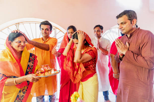 istock Multi-Generation Hindu Family Taking Blessings after the Prayers 1142377881