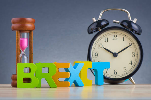 istock Alarm clock and alphabets word 