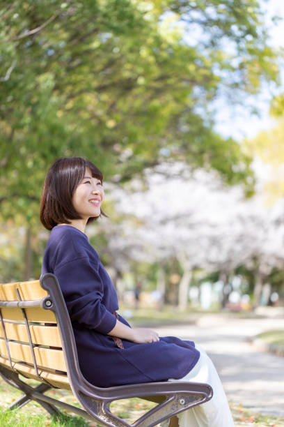 istock Woman relaxing on the bench 1142380824