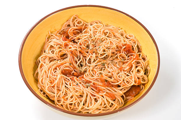 Serving of tomato basil pasta with garnish