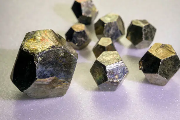 Pyrites. Pyrite is usually found associated with other sulfides or oxides in quartz veins, sedimentary rock, and metamorphic rock. Pyrite has been used since classical times to manufacture copperas.