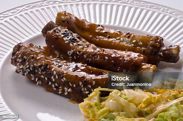 Foto de Três Costeletas Suínas e mais fotos de stock de Almoço - Almoço, Bife, Carne