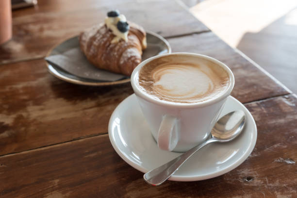 istock Croissant and cappuccino for breakfast 1142386367