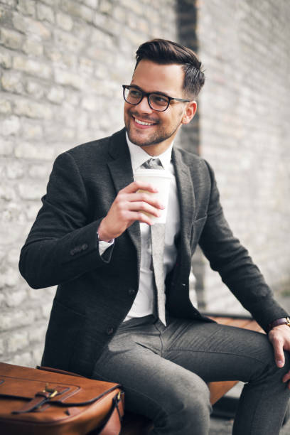 istock Businessman drinking coffee to go 1142386498