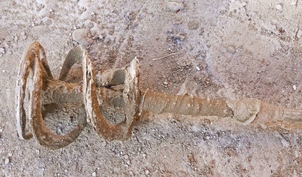 istock Tool for mixing mortar for terracotta. Loaded with mortar 1142388989