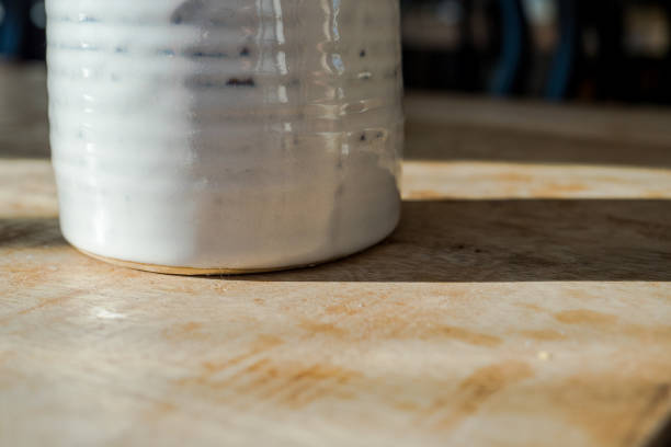 istock Flowerpot on a wooden table. 1142390496