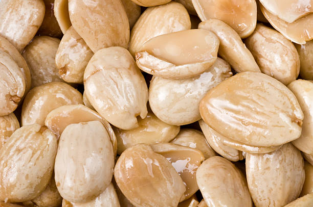 Spanish marcona almonds background stock photo