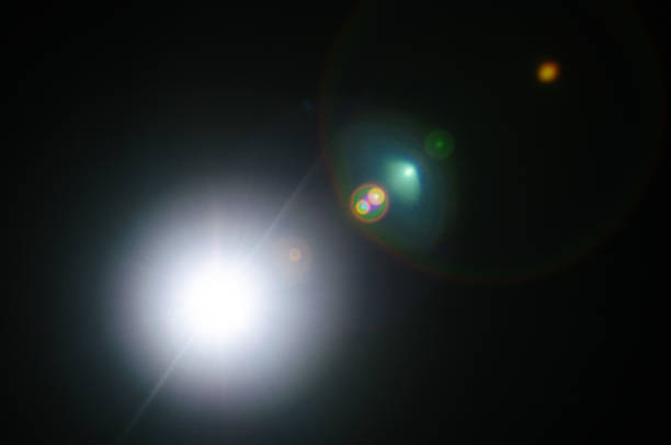 istock Abstract Natural Sun flare or Far star on the black background 1142392844
