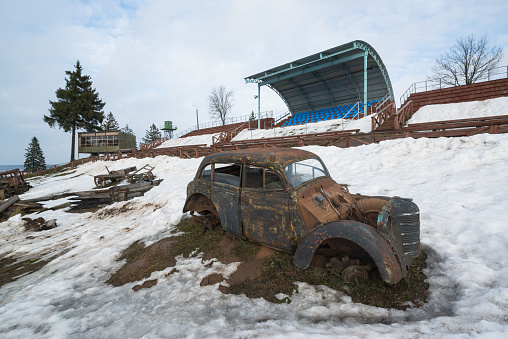 Loshany, Belarus, circa march 2019: Old rusty damaged car in the Historical and Cultural Complex Stalin Line in Loshany near Minsk, Belarus
