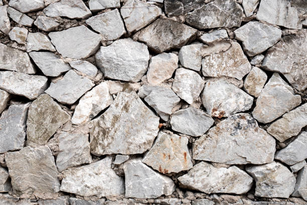 istock Round & pentagon stone background wallpaper 1142396714