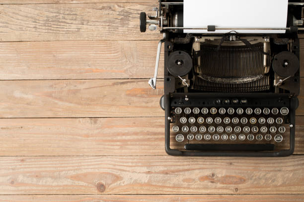 istock Top view of retro style typewriter in studio 1142396765