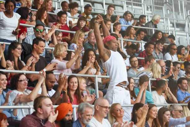 istock Standing man in crowds on stadium 1142402440
