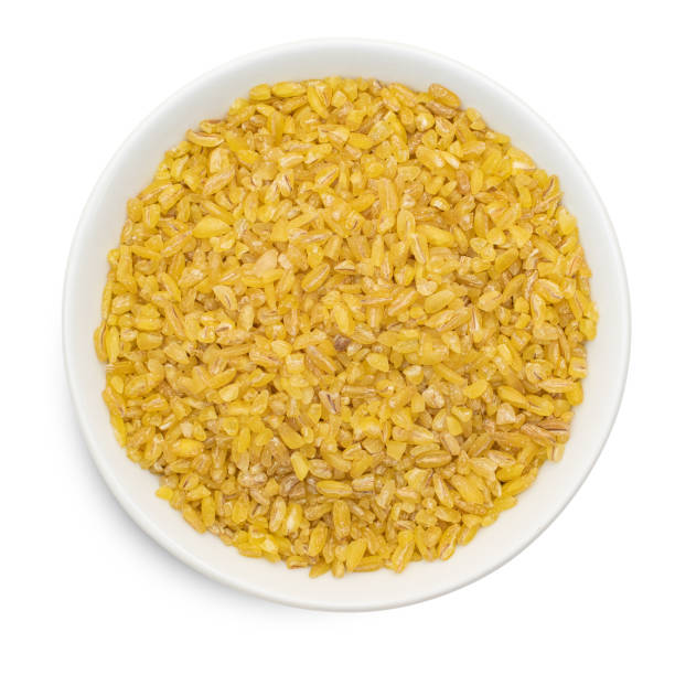 istock Bulgur in bowl isolated on white background. Top view 1142402494
