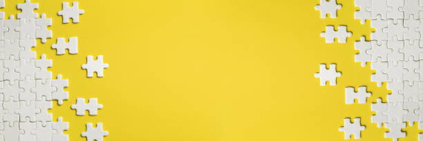 White details of puzzle on yellow background