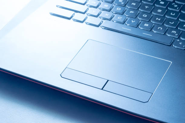 istock Laptop keyboard and touchpad: closeup picture 1142402529