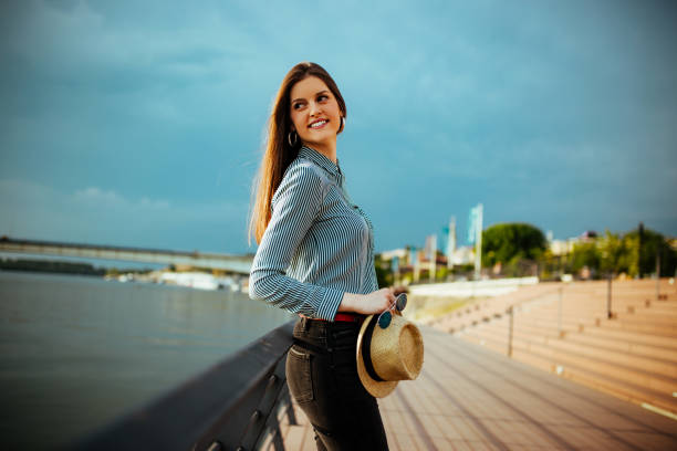istock Charming girl by the river 1142402825