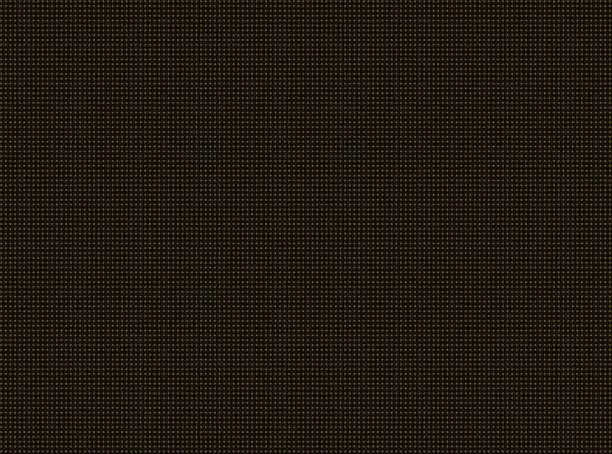 istock Small golden stars on black fabric background. 1142403643