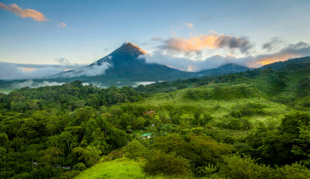 Arenal Volcano, Costa Rica Scenic view of Arenal Volcano in central Costa Rica at sunrise central america stock pictures, royalty-free photos & images