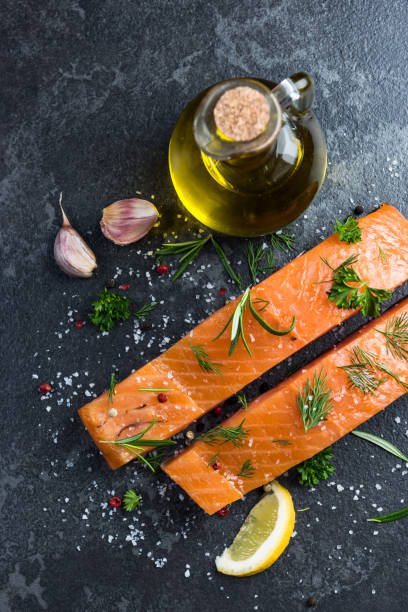 istock Preparing salmon fillets with herbs and spices 1142406004