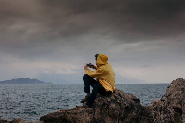 istock Handsome traveler taking photos 1142407183