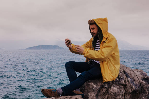 istock Traveler taking selfie at the beach 1142407194