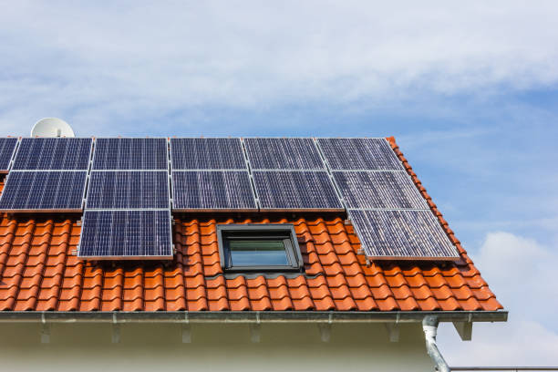 istock framing house with solar panels on rooftop 1142413232