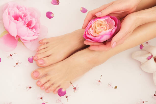 istock Beautiful female legs and feet. 1142413388