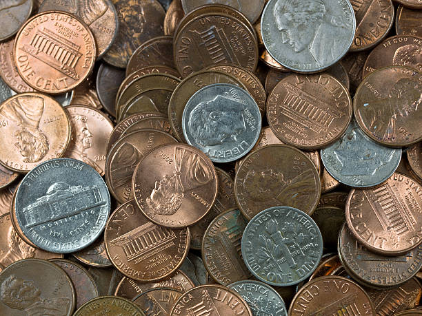 istock Pennies, nickels and dimes background 114241349