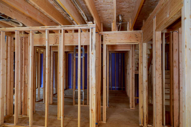 istock Home Framing unfinished wood frame building or a house 1142415717