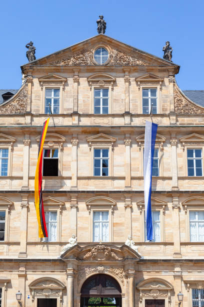 istock historic building in Bamberg Germany with flags 1142418308