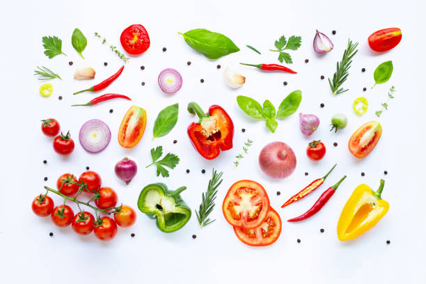 istock Various fresh vegetables and herbs on white background. Healthy eating concept 1142418653