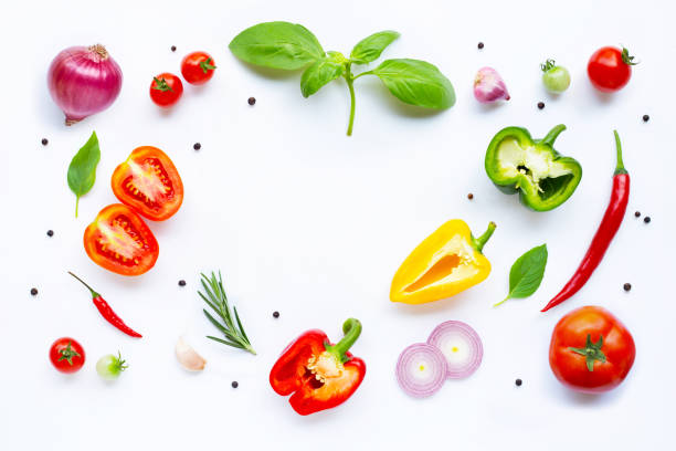 istock Various fresh vegetables and herbs on white background. Healthy eating concept 1142418665